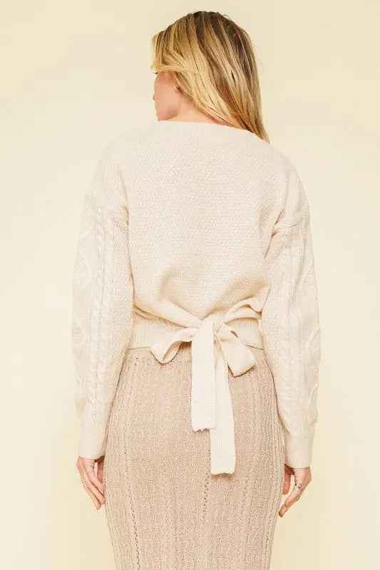 The Tiny Details Cable Knit Sleeve Tie Back Sweater