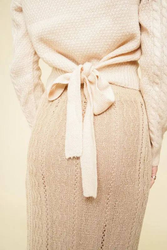The Tiny Details Cable Knit Sleeve Tie Back Sweater